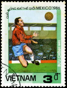 VIETNAM - CIRCA 1985: a stamp printed by VIETNAM shows football players. World football cup in Mexico 1986, circa 1985