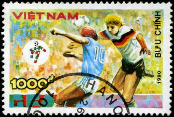 VIETNAM - CIRCA 1990: a stamp printed by Vietnam shows football players. World football cup in Italy, series, circa 1990