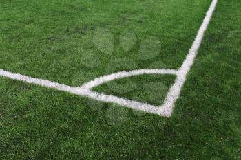 Soccer green field artificial grass with white lines 