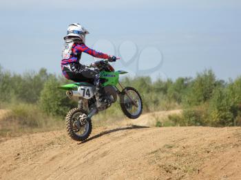 ARSENYEV, RUSSIA - AUG 30: Rider participates in the  round of the 2014 Russia motocross championship on August 30, 2014 in Arsenyev, Russia.