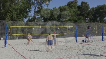 MOSCOW - JUNE 7: Playing beach volleyball in the Central Recreation Park on June 7, 2017 in Moscow, Russia.