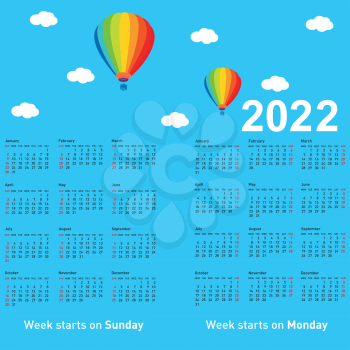 Calendar of 2022 with a balloon against a blue sky.