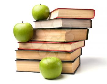 book stack with apple isolated on white background