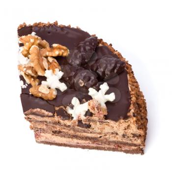 Slice of chocolate cream cake isolated on white