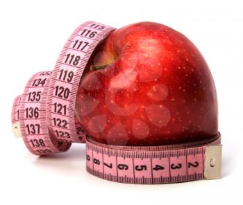tape measure wrapped around the apple isolated on white background