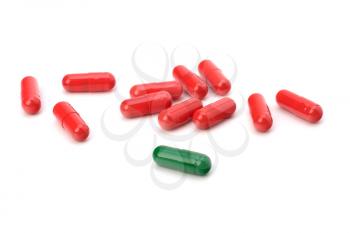 red capsules isolated on white background