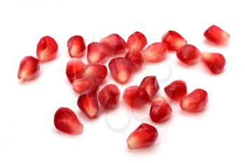 Ripe pomegranate seeds  isolated on white background