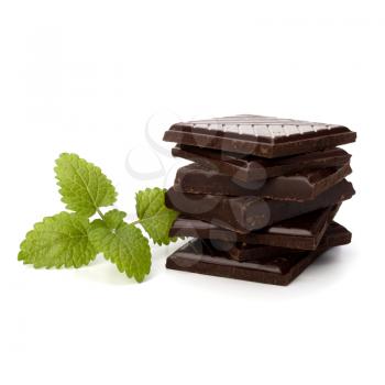 Chocolate bars stack and mint leaf isolated on white background