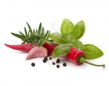 Chili pepper and flavoring herbs isolated on white background