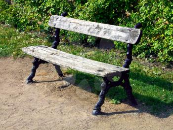 old bench wooden and  ferrous in park