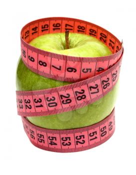 green apple and measuring ribbon for diet isolated on white background