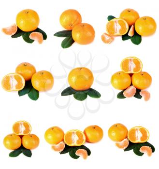 tangerine with green leaves isolated on white background