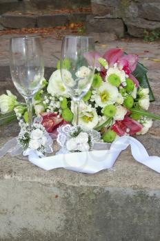 weddings two glasses for champagne and bouquet