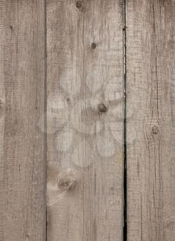 Close up of gray wooden fence panels 