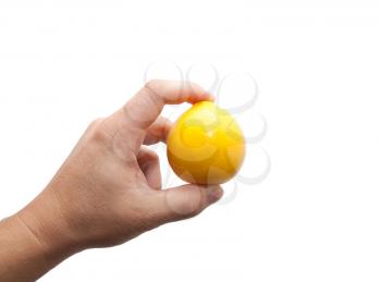 Lemon in a hand on a white background