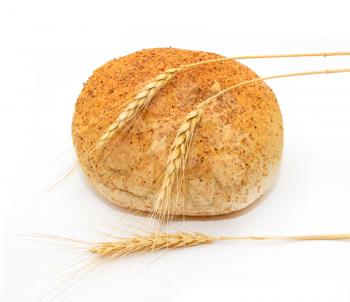 Wheat and bread on a white background