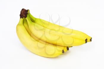 Photo of a sheaf of bananas on a white background 