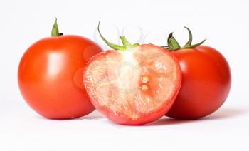 fresh tomatoes on the white background 