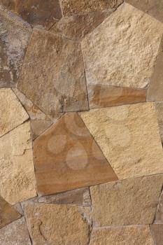 Unshaped stone wall pattern,wall made of rocks 