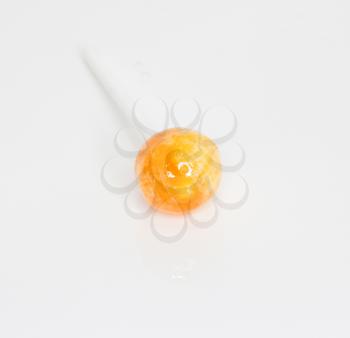 Orange candy isolated in white background 