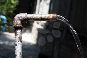 old rusty tap water