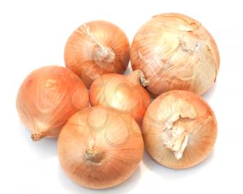 five ripe onions on a white background 