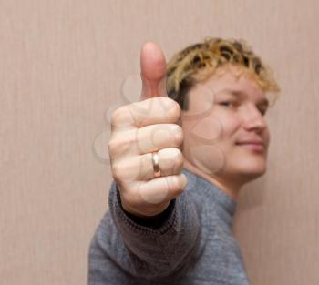 portrait of a man raise a finger up