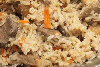 background of rice with meat. pilaf