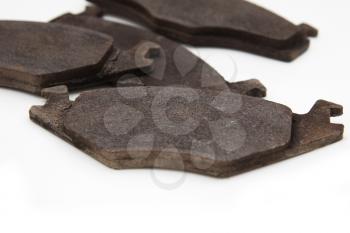 brake pads on a car on a white background