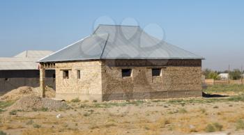 brick house in the steppes of Kazakhstan