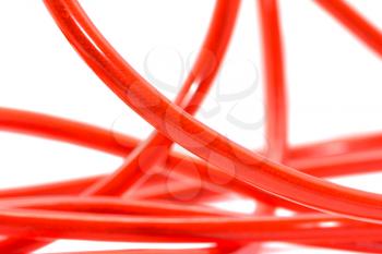 red wire on a white background. macro