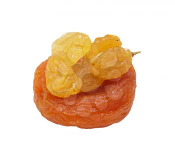 yellow raisins with dried apricots on a white background. macro