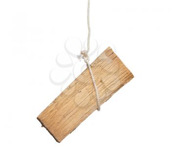a piece of wood on a rope on a white background