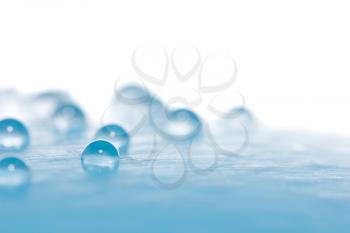 drops of water on a blue background. macro