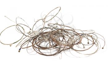 old metal strings on a white background
