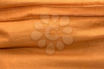 Background of golden fabric. texture