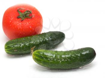 cucumber and tomato on white background