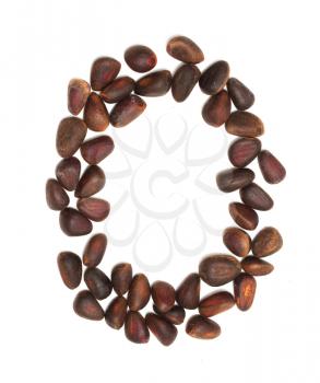 number zero of the pine nuts on a white background