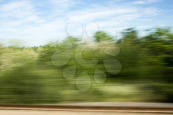 Nature in motion from the train window .