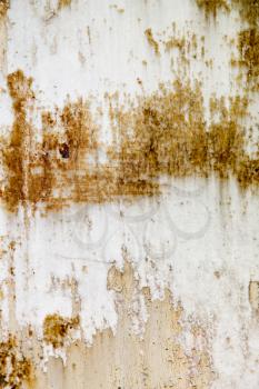background of rusty metal painted with cracked paint .