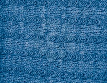 blue knitted fabric as a background. macro