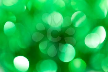 festive green bokeh as background