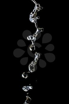 a jet of water on a black background