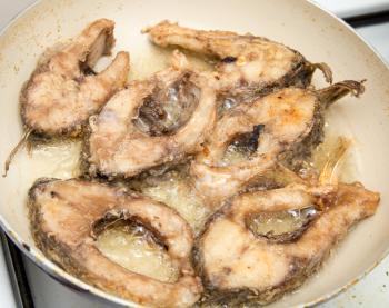 fish fried in a pan