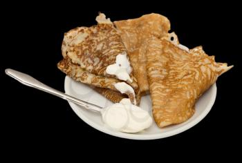 fried pancakes on a black background