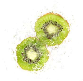 juicy kiwi fruit in water on a white background. macro