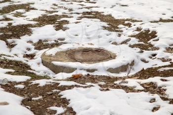 sewage pit in the snow