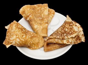 fried pancakes on a black background