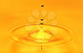 A drop of golden water. macro
