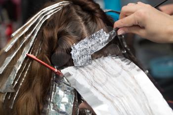 weave hair in a beauty salon